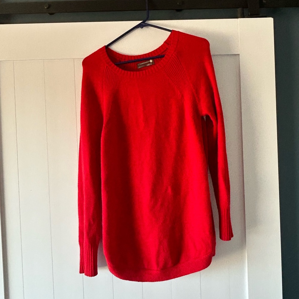 Red Anthropologie tunic sweater.